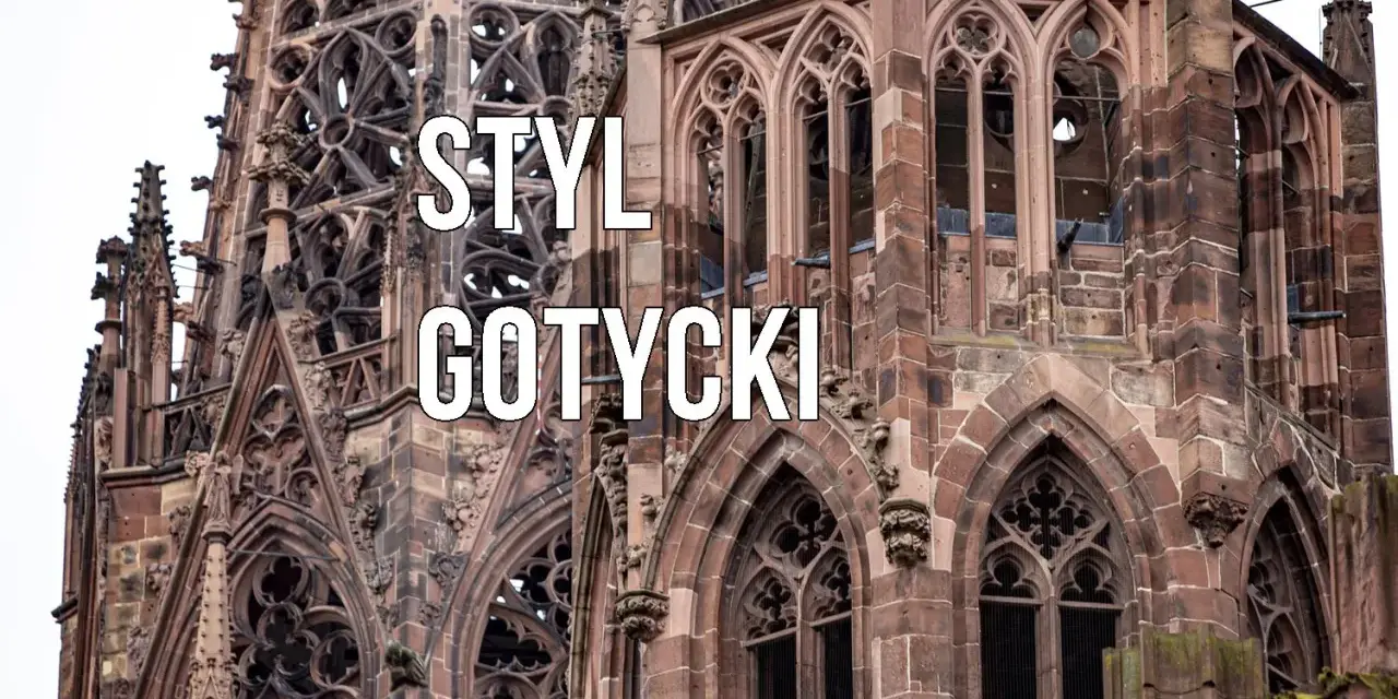 Kamienna wieża katedry w stylu gotyckim, z misternymi detalami i łukami.