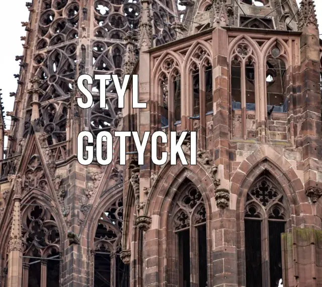 Kamienna wieża katedry w stylu gotyckim, z misternymi detalami i łukami.